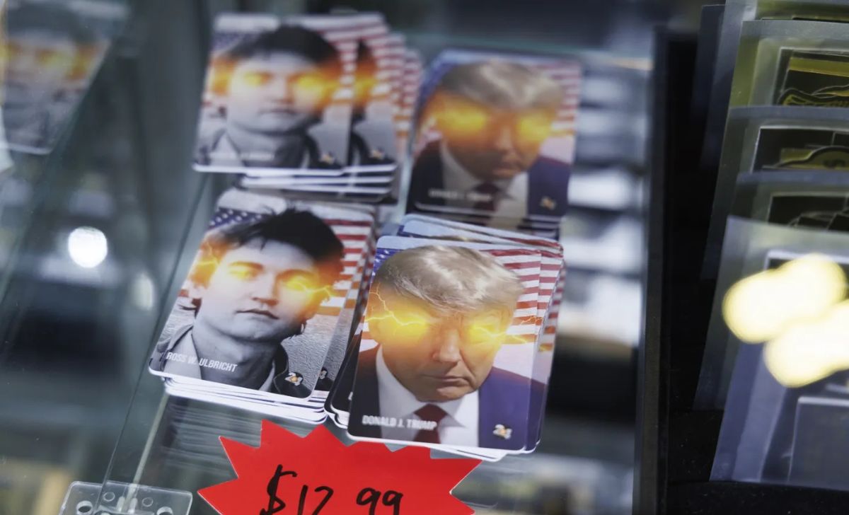 Cards featuring images of former US President Donald Trump and Ross Ulbricht, creator of Silk Road, are displayed for sale at the Bitcoin 2024 conference in Nashville on July 27.